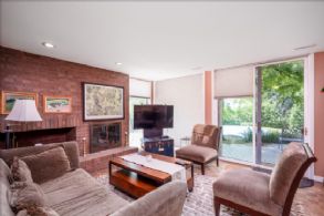 Family Room with Fireplace - Country homes for sale and luxury real estate including horse farms and property in the Caledon and King City areas near Toronto